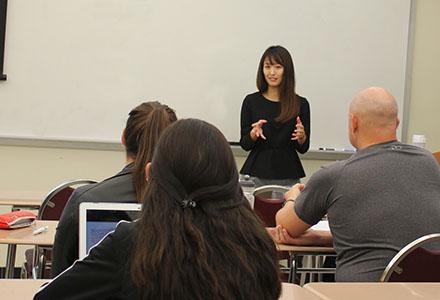 student speaks at accounting society meeting